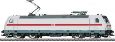 A side view of a model train locomotive.