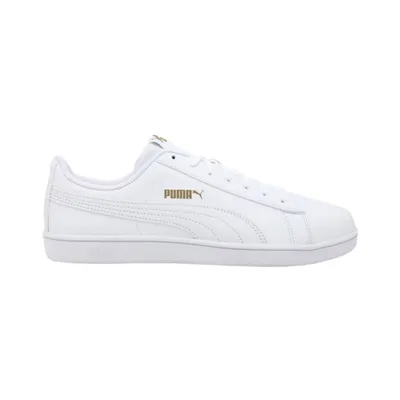 A white Puma sneaker with gold accents is shown against a white background.