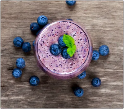 Produktbild von Spritzschutz Herdabdeckplatte Schneidebrett aus Glas Heidelbeerensmoothie 1-Teilig (60x52cm)