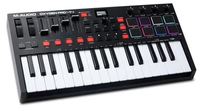 Produktbild von 32-tasten USB MIDI Keyboard-Controller – 32 anschlagdynamische Tasten, 8 RGB-Drums-Pads, NKS-Integration