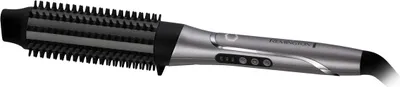 A silver and black Remington hair styling brush is shown against a white background.
