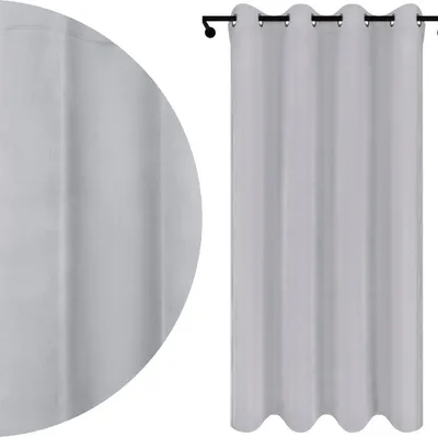 A close-up of a gray curtain fabric and a full view of a gray curtain hanging on a rod.