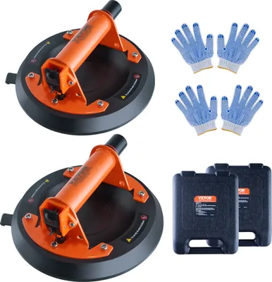 A set of two suction cup lifters, two pairs of gloves, and two storage cases are displayed against a white background.