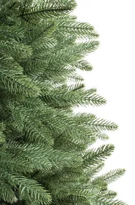 A close-up of artificial Christmas tree branches.