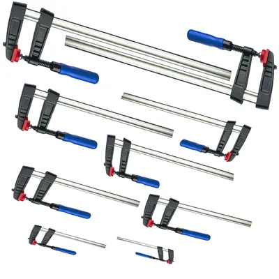 A collection of metal clamps with blue handles arranged on a white background.