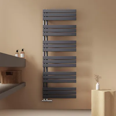 A modern bathroom setting with a grey towel radiator, a grey vanity unit with soap dispensers and a basket, and a small wooden stool with a vase.