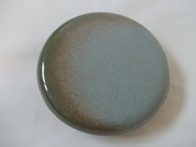 Produktbild von Reinigungskachel grün geflammt Putzdeckel für Kachelofen rund 15 cm