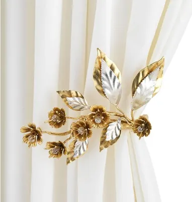 Produktbild von Casa Padrino Luxus Vorhanghalter Gold / Silber 22 x 18 x H. 22 cm - Eleganter Metall Gardienenhalter mit Glasperlen - Luxus Deko Accessoires