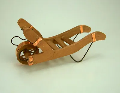 Produktbild von Schubkarre aus Holz mit Kupferbeschlägen, Länge 12 cm. Weihnachtskrippe.