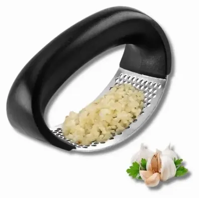 Produktbild von Knoblauchpresse aus Edelstahl, Micro-Schnitt, wenig Kraft, inkl. Silikon-Schaber und Bürste