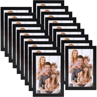Immagine prodotto di Set di cornici per foto, 18 pezzi, formato 10x15 cm, colore nero, da appendere a parete o da appoggiare su un tavolo
