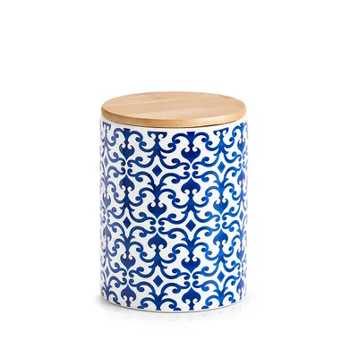 A ceramic storage jar with a blue and white pattern and a bamboo lid, isolated on a white background.