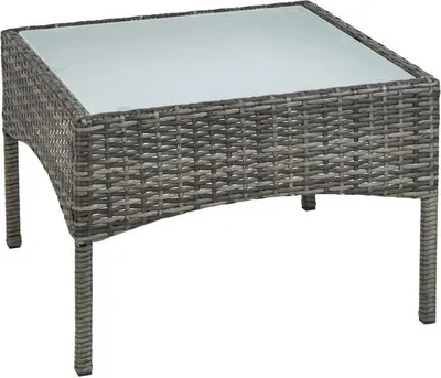 A polyrattan side table with a glass top, presented on a white background.