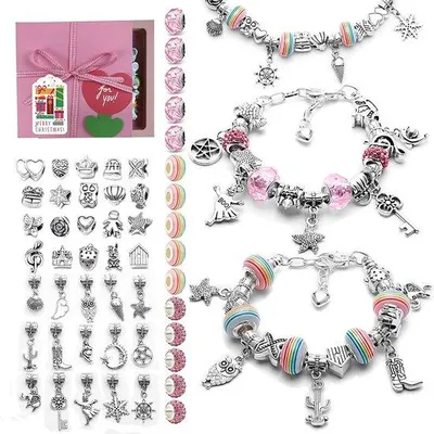 Immagine prodotto di Kit per creare braccialetti fai-da-te Tomivo® per bambine – 3 catenine a forma di serpente argentate, 20 perline metalliche, 15 perline decorative, 5 perline a forma di arcobaleno, 5 perline di cristallo rosa e 5 perline di diamanti rosa, confezione regalo