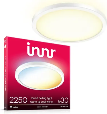 A product box for a round ceiling light, with the light itself shown above it.