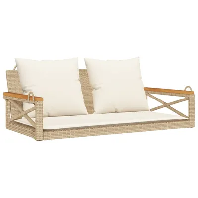 A beige poly rattan hanging bench with white cushions, shown against a white background.