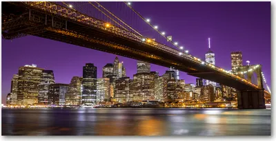 Produktbild von Tulup® Glas-Bild - 100x50 -Wandkunst - Wandbild hinter gehärtetem Sicherheitsglas  - Sehenswürdigkeiten & Architektur - Manhattan bei Nacht - Lila