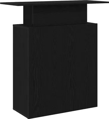 A black reception desk with a lift-top.