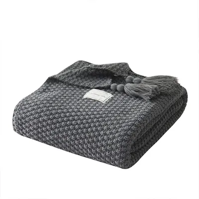 Immagine prodotto di Coperta in maglia, con frange, realizzata in materiale morbido, ideale per il divano