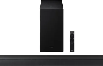 A black soundbar, subwoofer, and remote control are displayed against a white background.