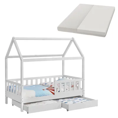 A white wooden house-shaped bed frame with two drawers underneath and a mattress placed on top.