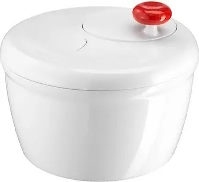 A white salad spinner with a red crank handle is shown against a white background.
