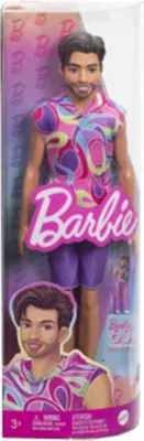 A Barbie Fashionistas Ken doll in its packaging.