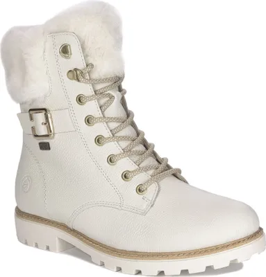 A white women's boot with fur lining and laces.