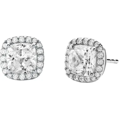 A pair of diamond stud earrings on a white background.