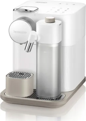 A white De'Longhi Nespresso coffee machine with a water tank and drip tray.