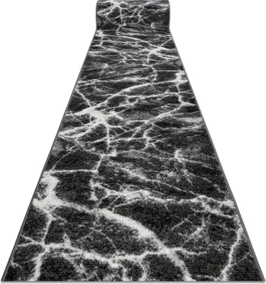 A rolled-up carpet runner with a marble pattern.