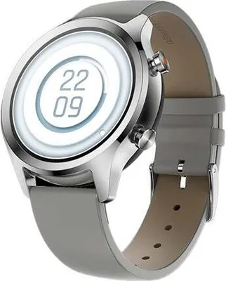 A close-up studio shot of a silver smartwatch with a gray leather strap, displaying the time on its white AMOLED screen.