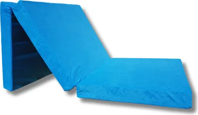 A blue folding mattress is shown in a studio setting.