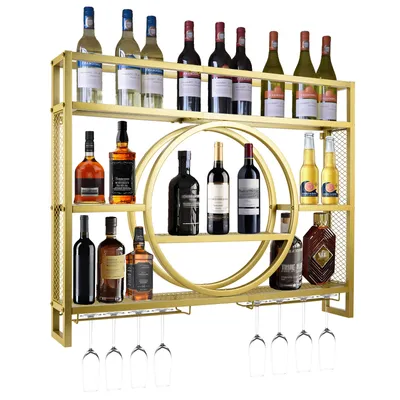 A gold metal wine rack filled with various bottles of wine and spirits.