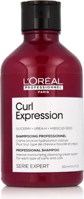 A bottle of L'Oréal Professionnel Curl Expression shampoo against a white background.