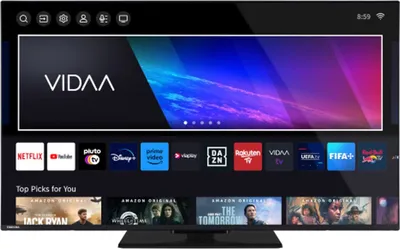A smart TV displaying a streaming service interface with various app logos and movie posters.