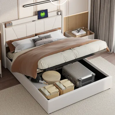 A bedroom scene with a bed that has storage underneath, showcasing items stored within.