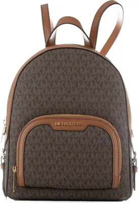 A brown Michael Kors backpack with tan accents and straps, shown from the front against a white background.