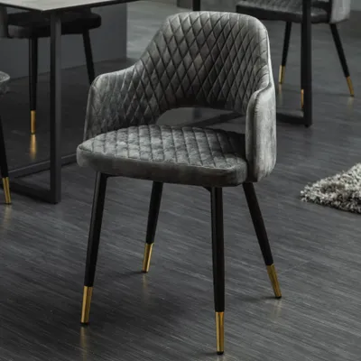 Produktbild von riess-ambiente Design Stuhl PARIS grün Samt mit Armlehnen Ziersteppung goldene Fußkappen Esszimmerstuhl Konferenzstuhl