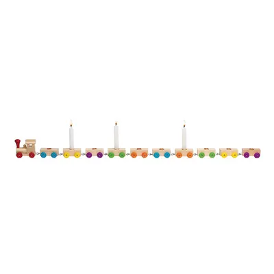 A wooden train with candle holders and candles.