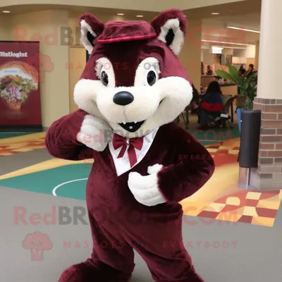 Productafbeelding van Maroon Skunk mascotte REDBROKOLY kostuum karakter gekleed met een corduroy broek en strikjes