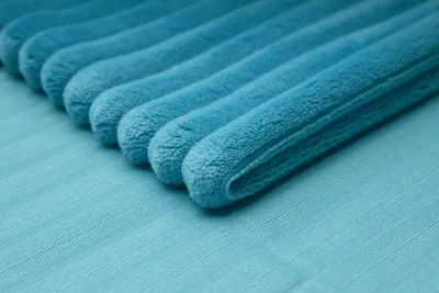 Obrázek produktu pro Pletenina Minky Stripes, tyrkysová 50 x 160 cm
