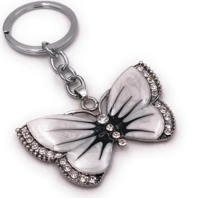 Produktbild von Onwomania Schlüsselanhänger Schmetterling weiß Tagfalter Strass silber  Anhänger Keychain
