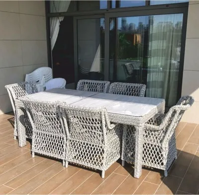 Produktbild von Casa Padrino Luxus Rattan Gartenmöbel Set Grau - 1 Gartentisch & 6 Gartenstühle