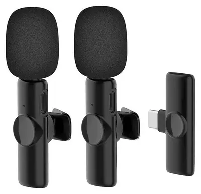 Three black wireless microphones with foam windscreens and a USB-C receiver are displayed against a white background.