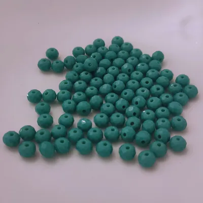 Produktbild von Glasperlen - Typ 'Facettiert' - 100 Stück - 6 mm - Türkis matt