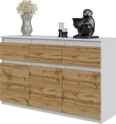 A white and wood-grain sideboard with decorative items on top.