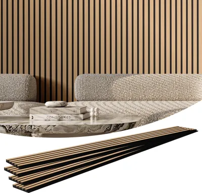 A set of acoustic panels is shown in a studio setting with a couch and coffee table.