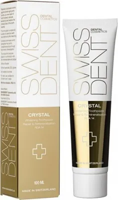 A product shot of Swissdent Crystal Repair & Whitening Toothcream and its packaging.