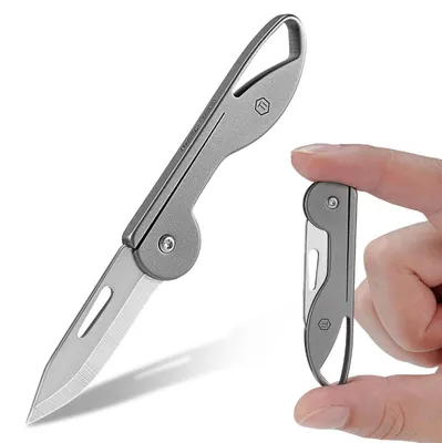 Immagine prodotto di Coltello tascabile pieghevole, mini, titanio, grigio, lama affilata come una rasoio, ideale per l'uso quotidiano, portachiavi